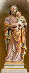 Fototapeta na wymiar VIENNA, AUSTIRA - JUNI 18, 2021: The statue of St. Joseph in Herz Jesu church by unknown artist.