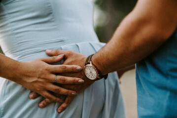 bride and groom holding hands