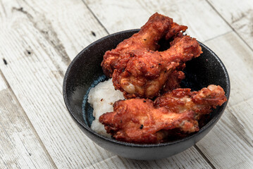 Fried chicken, steamed rice, Asian street food, on background