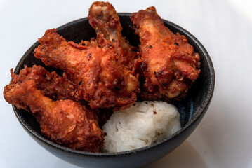 Fried chicken, steamed rice, Asian street food, on background