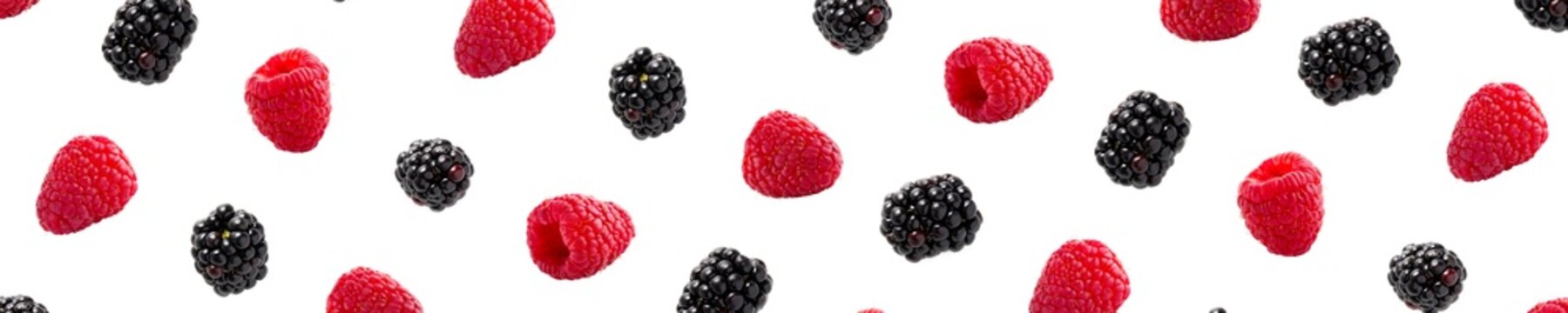 Raspberries abstract background. Fruit pattern of colorful wild berries isolated on white background. Raspberries, blackberry and brumble. Top view. Flat lay banner