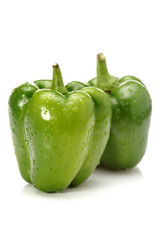 fresh green bell pepper (capsicum) on a white background