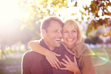 I love our walks in the park. Cropped shot of an attractive young couple at the park.