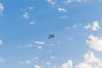 Dubai, UAE - 02.27.2022 - Dubai, UAE - Shot of an Spice Jet airlines airplane on blue sky background. Aviation