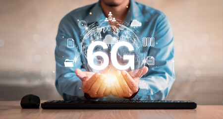 Businessman using world 6G network.
