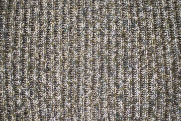 Texture of knitted wool sweater close-up, horizontal format