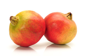Ripe pomegranate fruit isolated on white background 