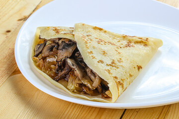 Pancake with mushroom and onion