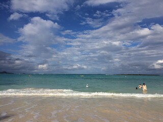 Ocean view at the beach of Honolulu, Hawaii, family swimming, year 2014