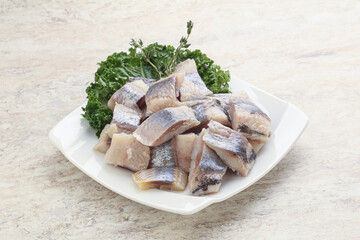 Herring fillet slice on the bowl