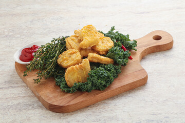 Crispy chicken nuggets with tomato ketchup