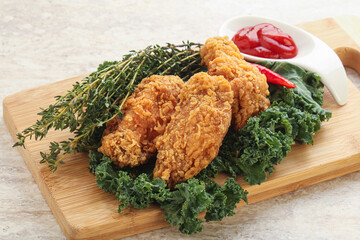 Crispy chicken wings with tomato ketchup