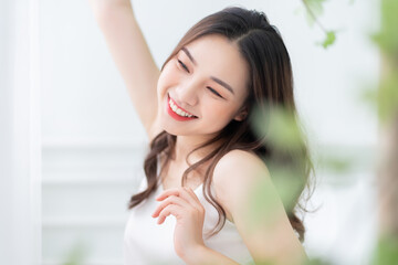 Naklejka premium Image of beautiful young Asian woman in the morning