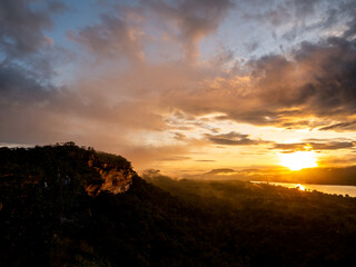 Sunrise over The Mountain with The River and The Fog