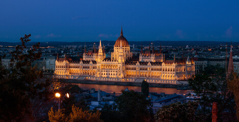Fototapeta na wymiar The Parliament building at night in Budapest, Hungary