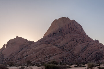 Impression of the Rocky Namibian Desert near Spitzkoppe during the golden hour around sunset.