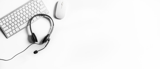 Headset and customer support equipment at call center ready for actively service , Communication support, call center and customer service help desk.for (call center) concept .