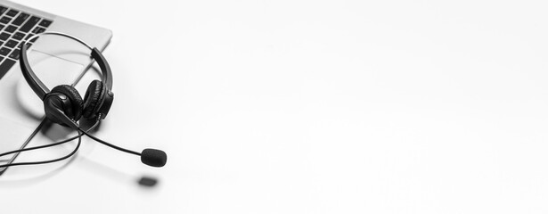 Headset and customer support equipment at call center ready for actively service , Communication support, call center and customer service help desk.for (call center) concept .