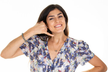 Woman cheerful happiness make phone gesture call me back sign with fingers phone cell isolated on...