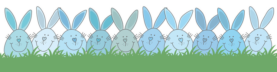 Reihe von blauen Osterhasen verstecken sich auf der Wiese