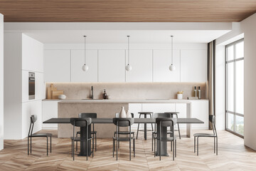 Light kitchen set interior with eating table and seats, countertop and window