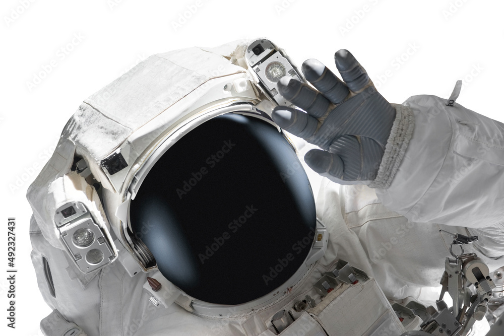 Wall mural astronaut in spacesuit isolated over white background