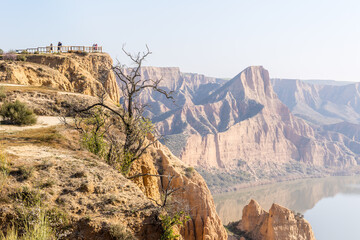 clay ravines, covered in fog, called the barrancas del burujon in Toledo