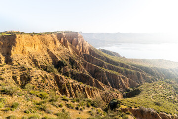 clay ravines, covered in fog, called the barrancas del burujon in Toledo