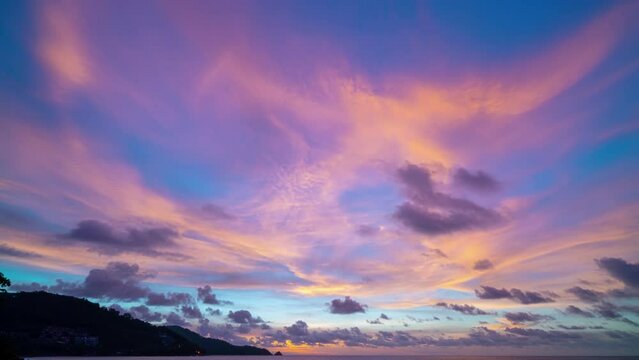 Beautiful 4K Time lapse of Majestic sunrise or sunset sky landscape Amazing light of nature cloudscape sky and Clouds moving away rolling.Colorful dark sunset cloud Footage timelapse Travel background