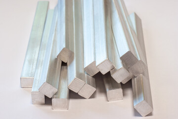a handful of aluminum bars