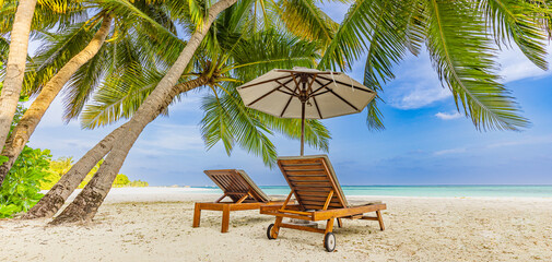 Perfect tropical beach banner. White sand and coco palms travel tourism wide panorama concept. Amazing beach landscape, two chairs, umbrella. Tranquil couple romance, exotic island vacation resort