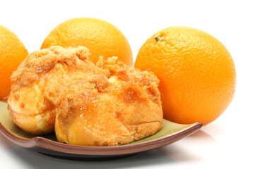 Natural delicious breakfast bread and Orange on white background