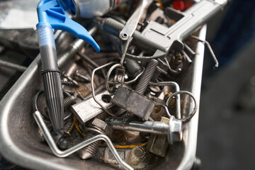 Mechanic tools for auto repair in garage close-up