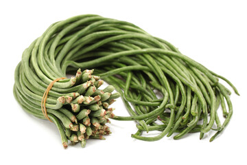 Purple and green Chinese long beans on white background
