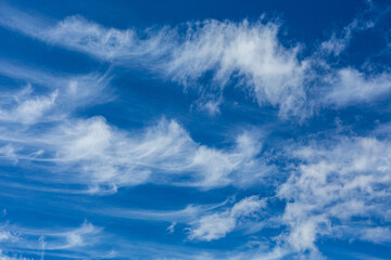 Cirrus and Stratus clouds in dramatic blue sky over Cape Town