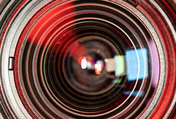 Selective focus and close up image of front of camera lens with beautiful light