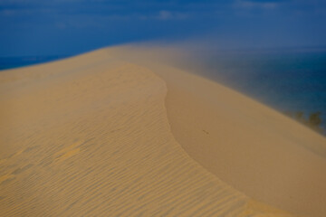 Wind blowing off sand in Bazaruto archipelago, Mozambique