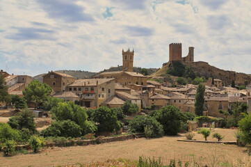 Fototapeta na wymiar View of the medieval village of Uncastillo an its romanesque castle. Zaragoza, Aragón, Spain