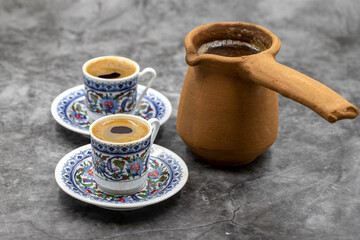 Turkish coffee on a dark background. Traditional Turkish cuisine flavor. close up