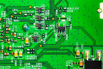 Close up of components and microchips on PC circuit board.