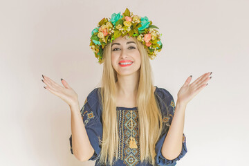 Ukrainian fashionable woman in embroidery traditional shirt. Concept of brave Ukraine and people of that country 