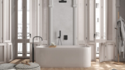 Blur background, modern bathroom in classic apartment, window with shutters and parquet. Freestanding bathtub, pouf with accessories, rack with bathrobe. Minimalist interior design