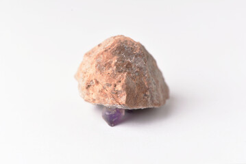 amethyst crystal grown on another stone ,marble, granite,