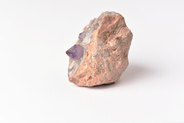 amethyst crystal grown on another stone ,marble, granite,