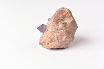 amethyst crystal grown on another stone ,marble, granite,