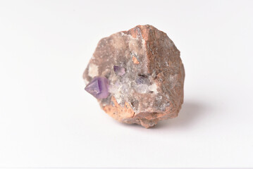 amethyst crystal grown on another stone ,marble, granite,