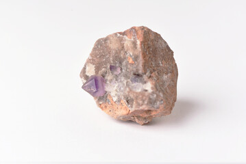 amethyst crystal grown on another stone ,marble, granite,