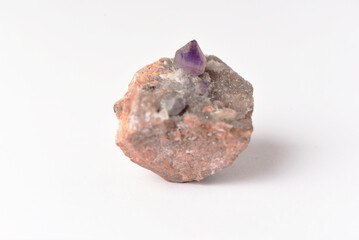 amethyst crystal grown on another stone ,marble, granite,
