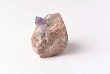 amethyst crystal grown on another stone ,marble, granite,