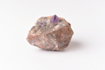 amethyst crystal grown on another stone ,marble, granite,